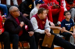 McKinney on the bench in his long-time role as Assistant Coach for the Triton College women's basketball team.